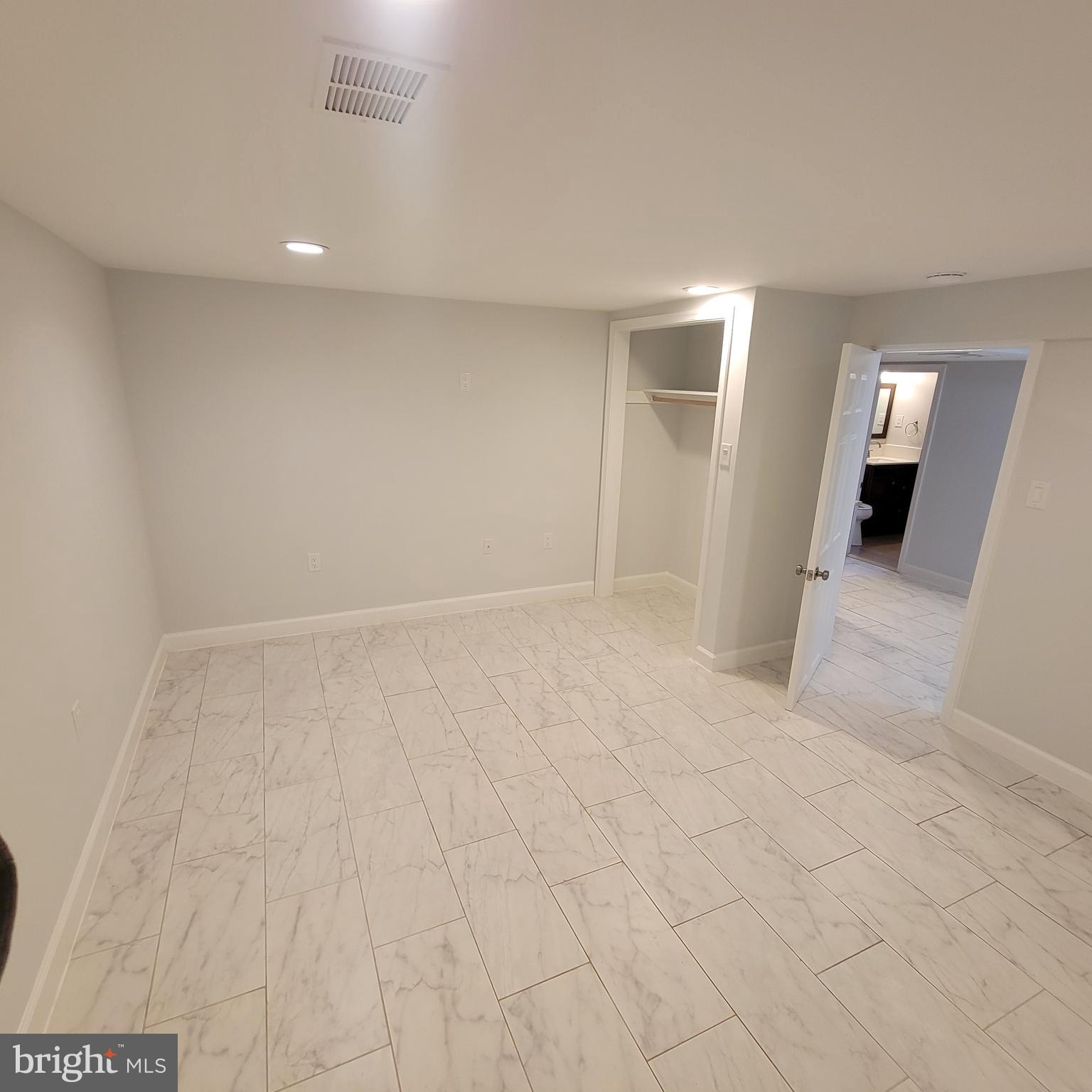 18320 Metz Drive Germantown, MD 20874 - Photo 23 of 31 a view of a big room with closet and windows