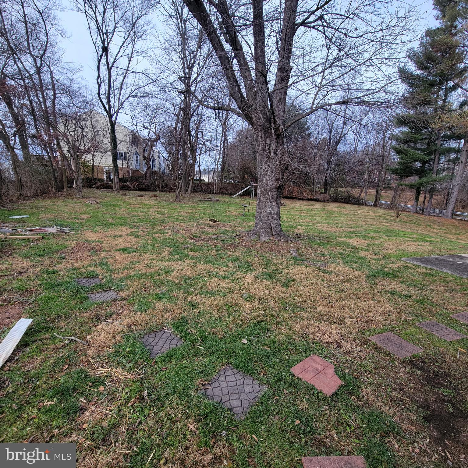 18320 Metz Drive Germantown, MD 20874 - Photo 25 of 31 a backyard of a house with lots of green space