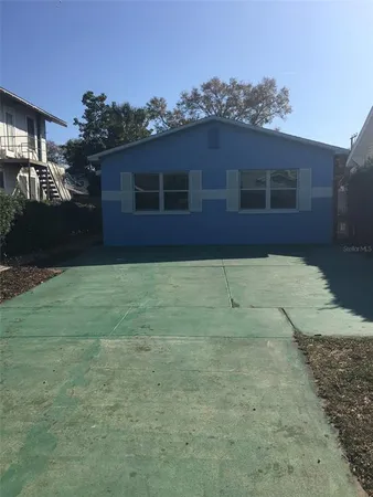 a view of a back yard of the house