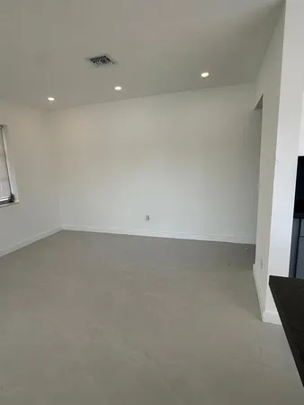 an empty room with a workbench