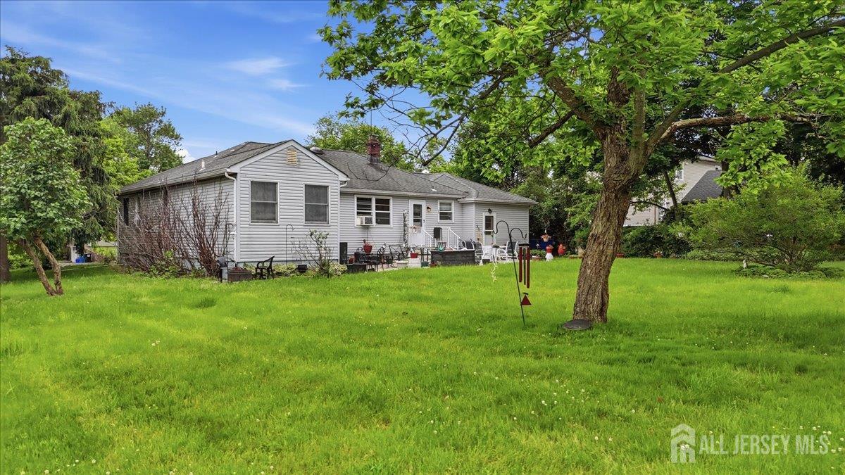 33 Ellison Road Somerset, NJ 08873 - Photo 20 of 38 a front view of house with yard and green space