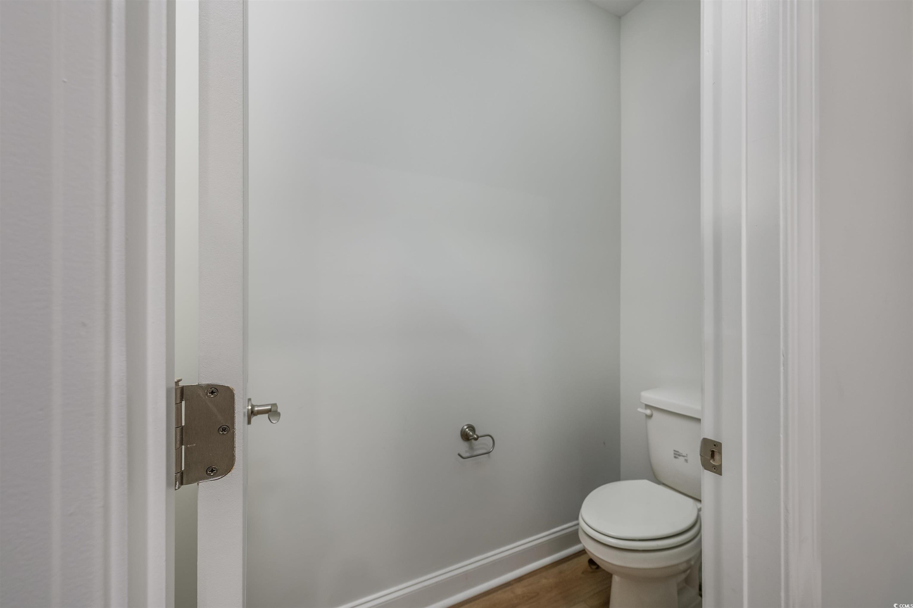 2550 Dogwood Road Longs, SC 29568 - Photo 13 of 35 Bathroom with baseboards and wood finished floors