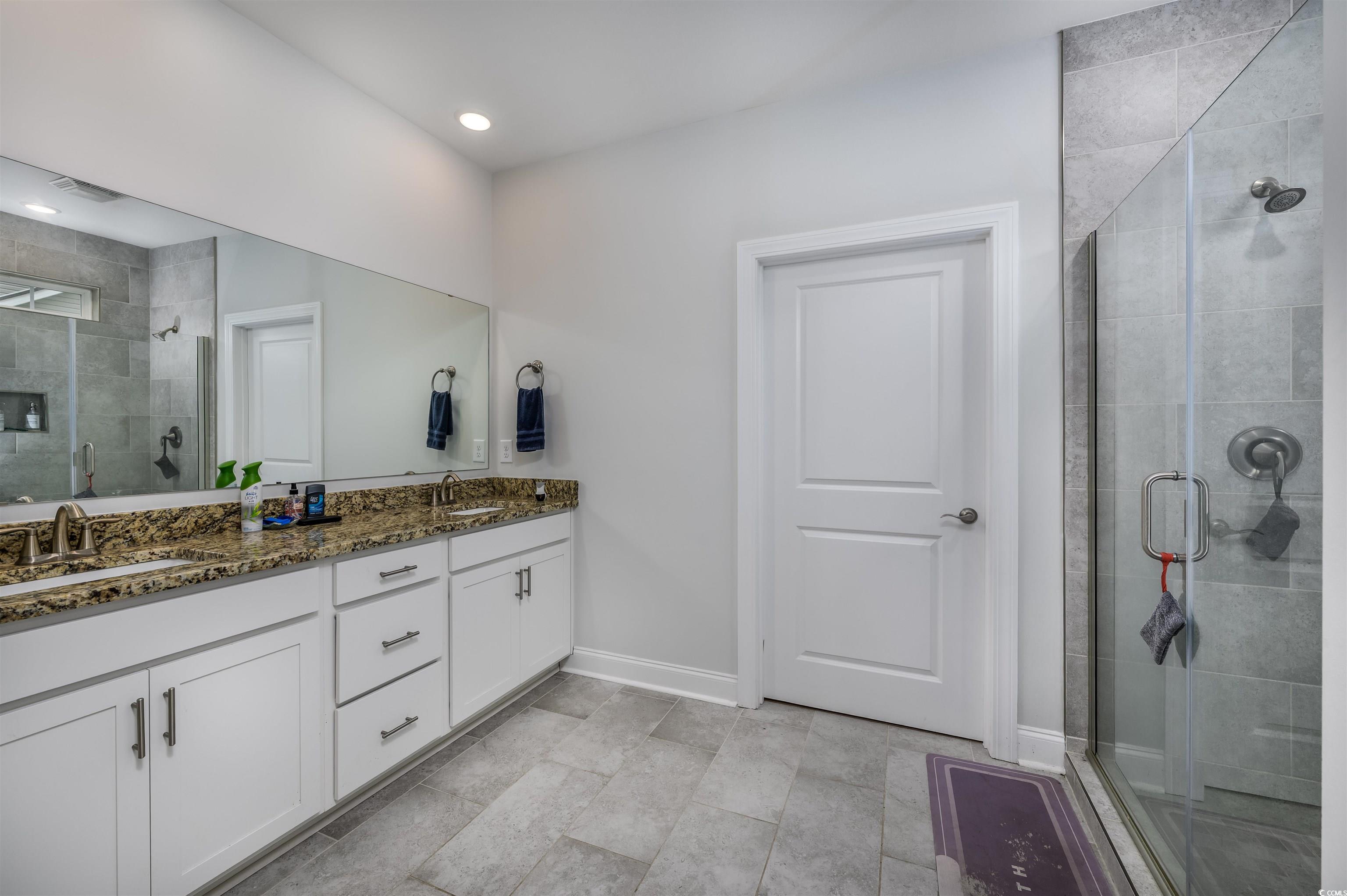 2550 Dogwood Road Longs, SC 29568 - Photo 17 of 35 Full bath with a shower stall and double vanity