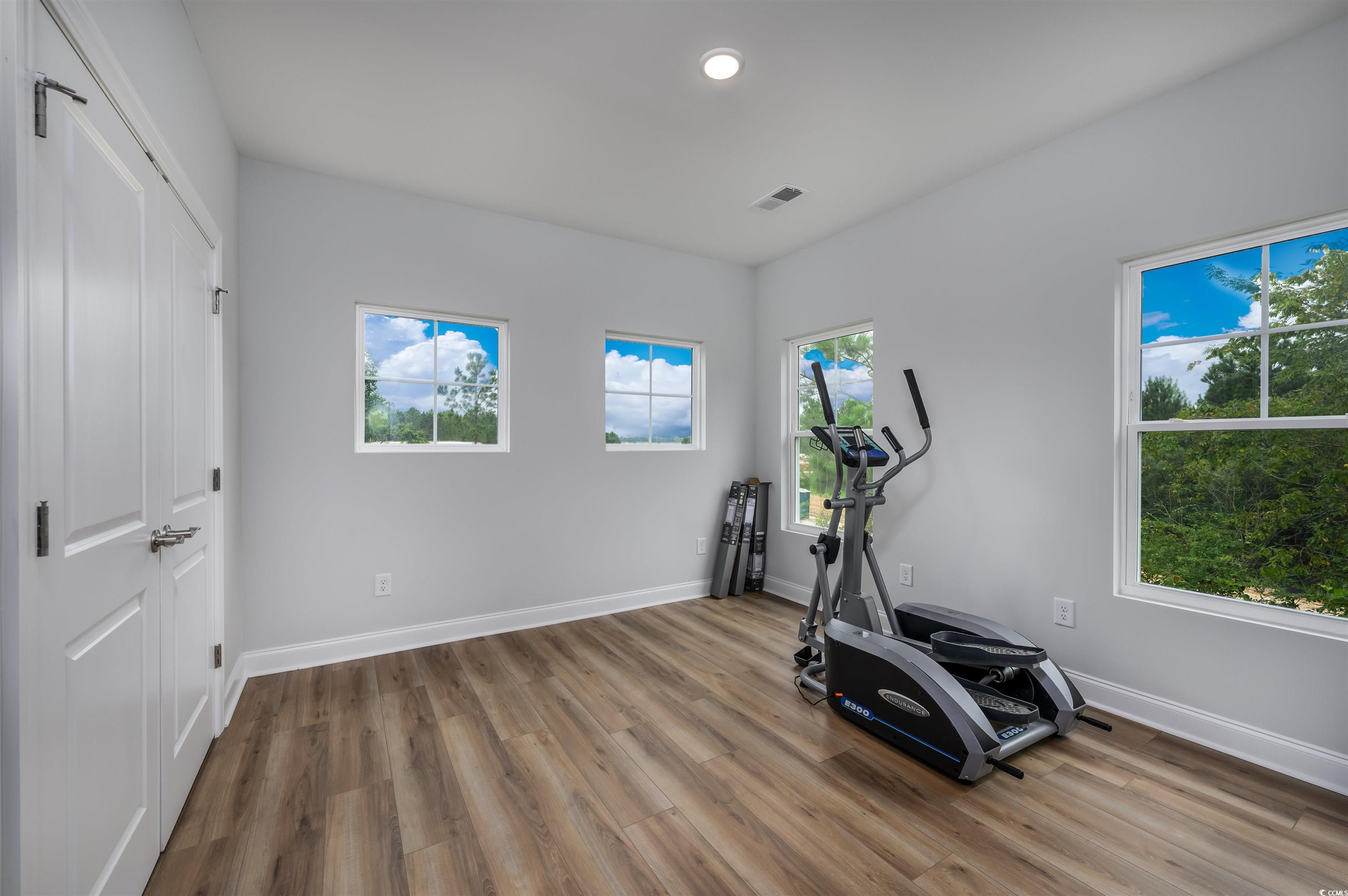 2550 Dogwood Road Longs, SC 29568 - Photo 23 of 35 Workout area featuring light wood-style floors and recessed lighting