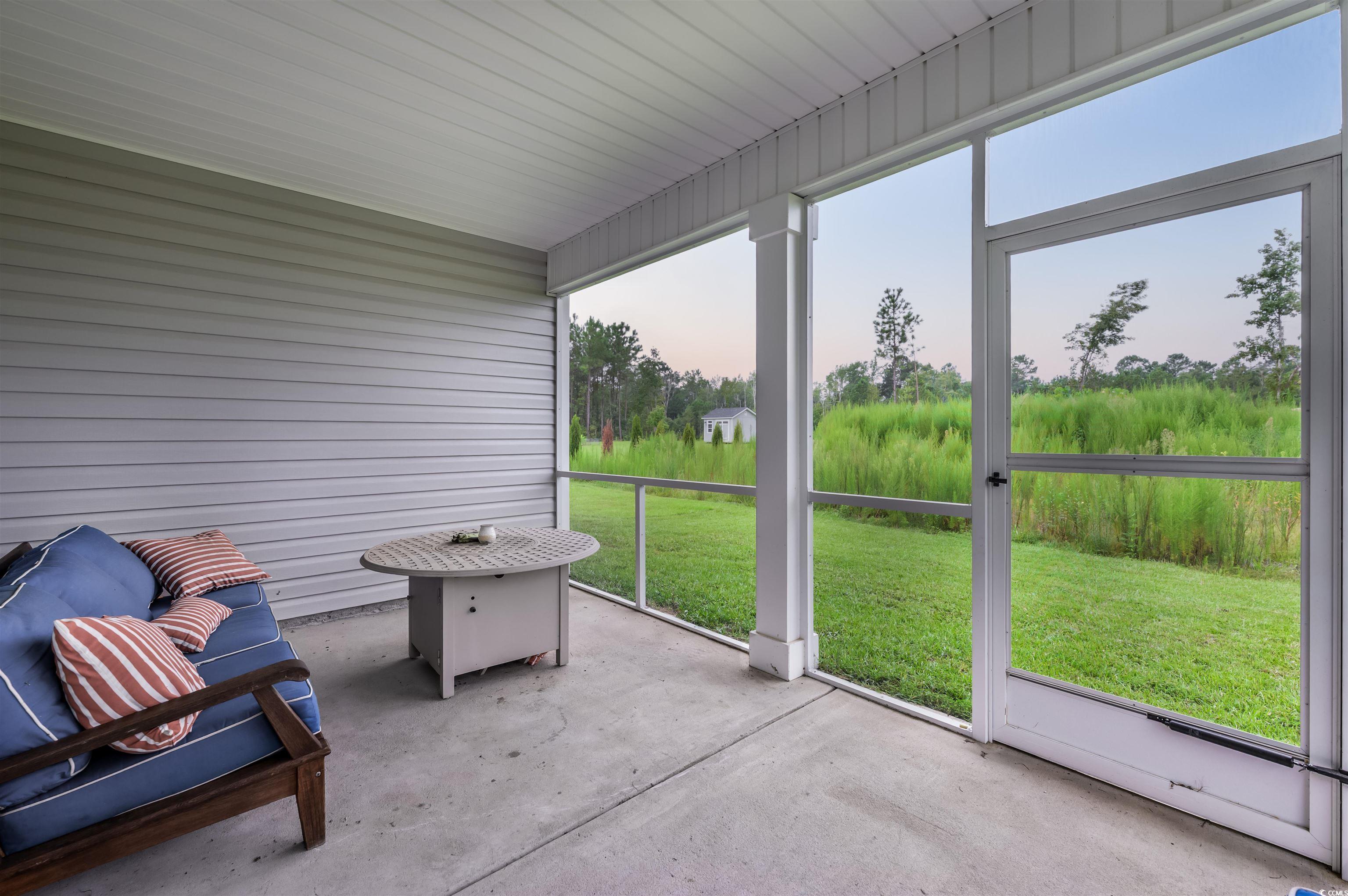 2550 Dogwood Road Longs, SC 29568 - Photo 29 of 35 Sunroom with a patio