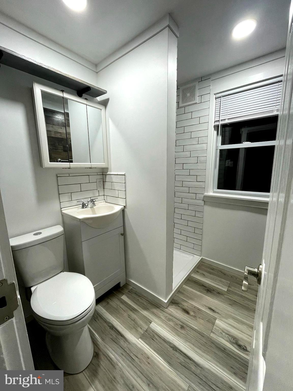 506 Rancocas Avenue Hainesport, NJ 08036 - Photo 8 of 22 a bathroom with a toilet and a sink