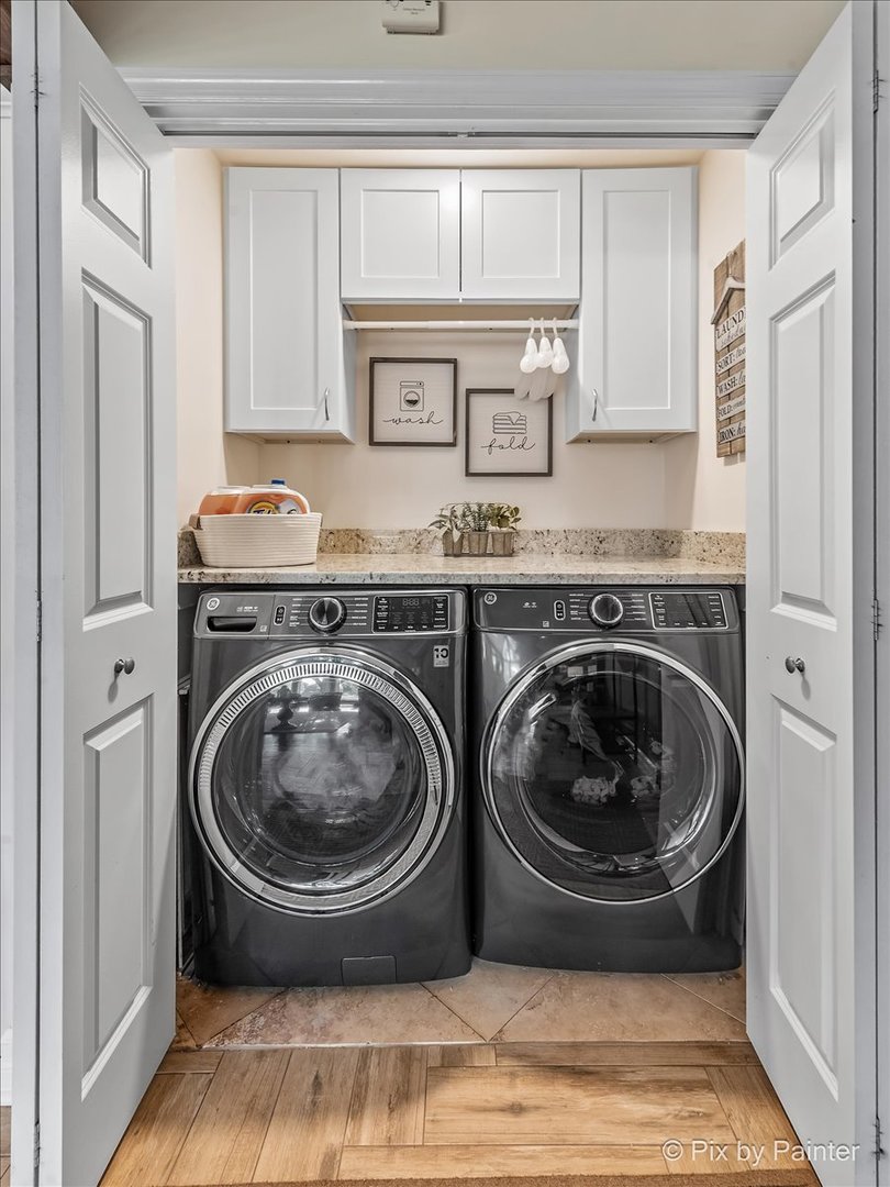 2628 Knob Hill Road Johnsburg, IL 60051 - Photo 26 of 43 a view of a washer and dryer in a kitchen