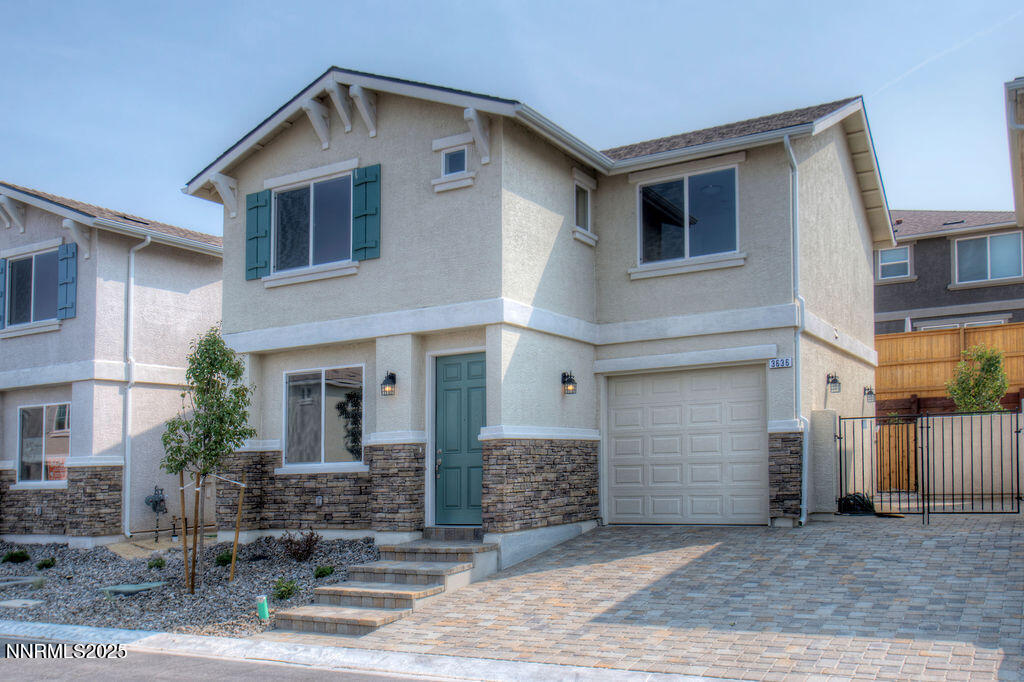 1168 Arrastra Road, Unit LOT 18 Reno, NV 89512 - Photo 1 of 24 a front view of a house with garden
