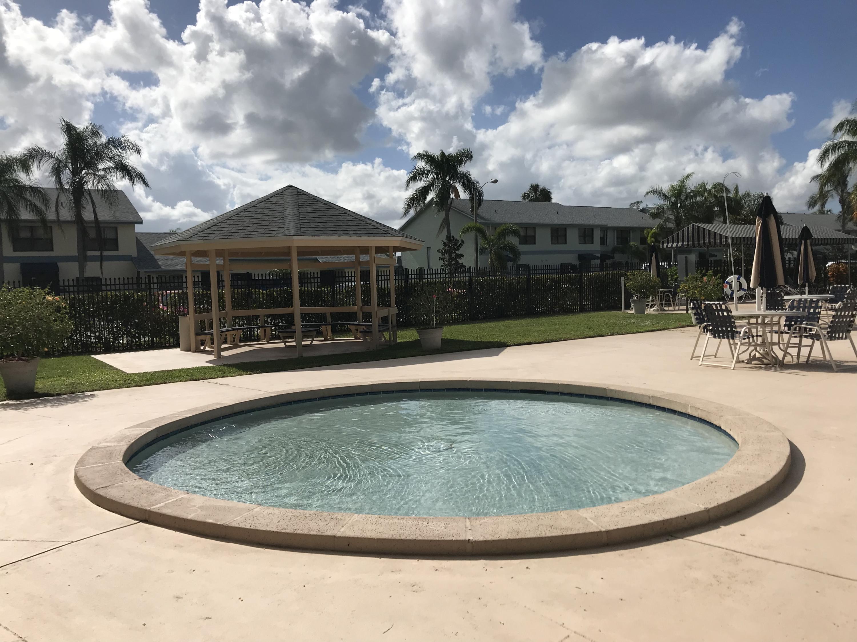 9087 Southwest 22nd Street, Unit A Boca Raton, FL 33428 - Photo 4 of 21 IMG_1953