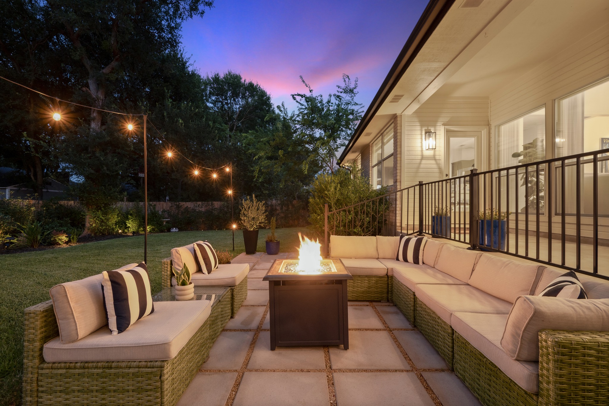 30115 Sawgrass Trail Georgetown, TX 78628 - Photo 21 of 37 Gather around a warm fire pit with ample seating on this inviting backyard patio.