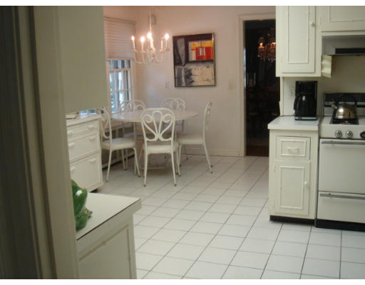 105 Country Club Road Newton, MA 02459 - Photo 4 of 16 a dining room with furniture