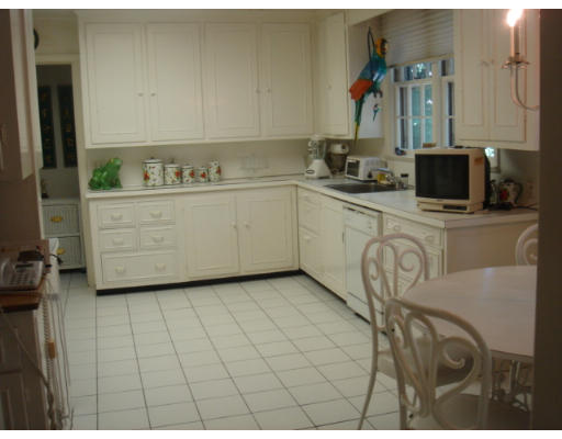 105 Country Club Road Newton, MA 02459 - Photo 5 of 16 a kitchen with a sink and cabinets