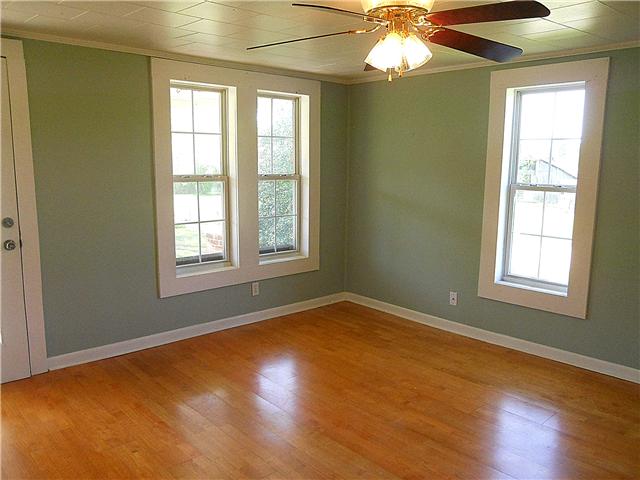 10515 Moss Branch Road Bon Aqua, TN 37025 - Photo 12 of 20 Downstairs bedroom has windows & a door to the front porch.