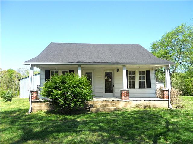 10515 Moss Branch Road Bon Aqua, TN 37025 - Photo 3 of 20 Very cute farmhouse has almost new roof and central HVAC. Most of the windows are also new.