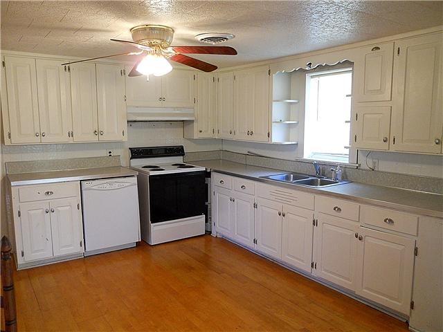 10515 Moss Branch Road Bon Aqua, TN 37025 - Photo 8 of 20 Kitchen is in good condition & comes with stove and dishwasher.