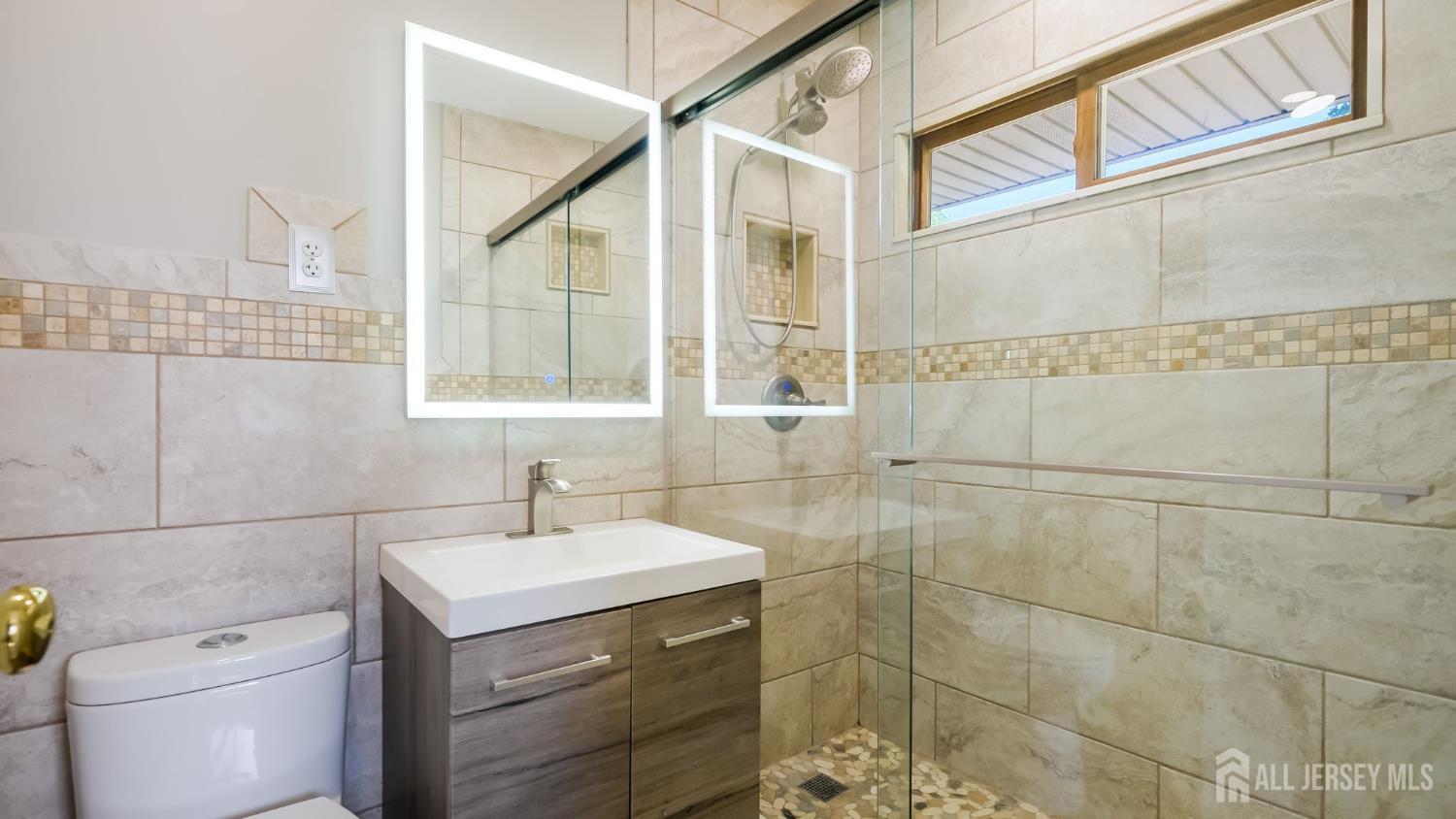 50 Sand Hills Road Kendall Park, NJ 08824 - Photo 2 of 27 a bathroom with a sink toilet and shower