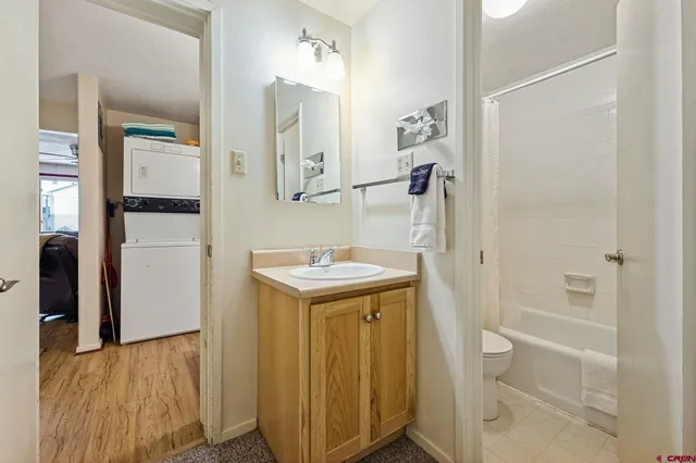 a bathroom with a sink and mirror