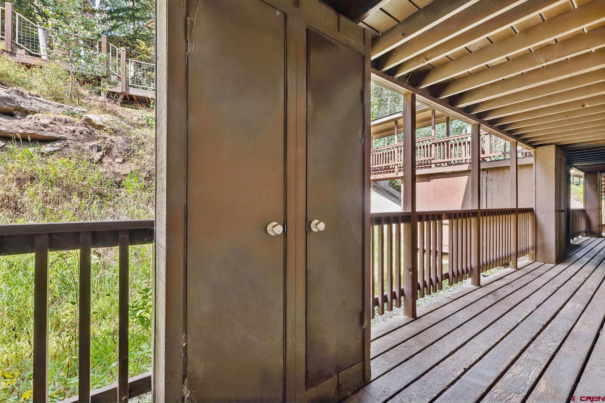 400 Sheol Street, Unit 7 Durango, CO 81301 - Photo 27 of 35 a view of a balcony with wooden floor