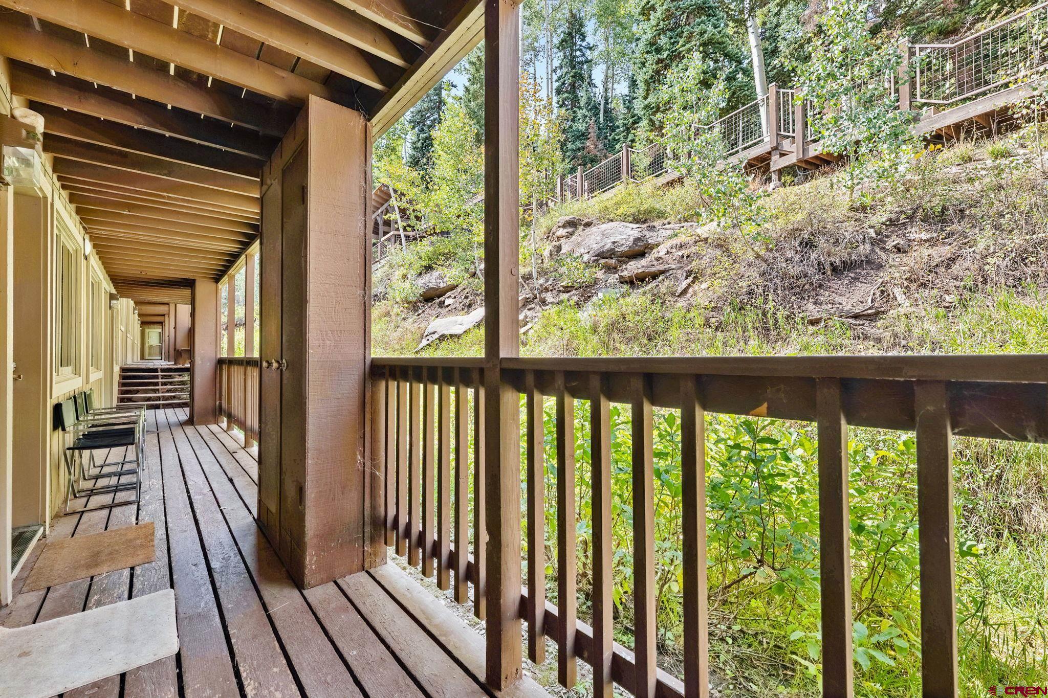 400 Sheol Street, Unit 7 Durango, CO 81301 - Photo 28 of 35 a view of a balcony with wooden floor