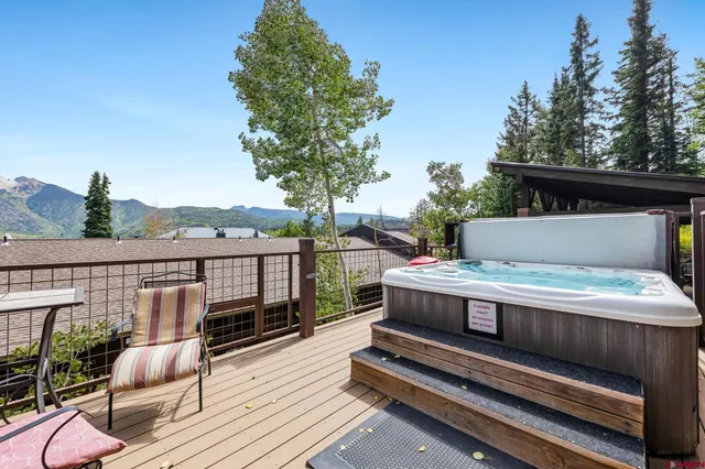 a view of roof deck with furniture