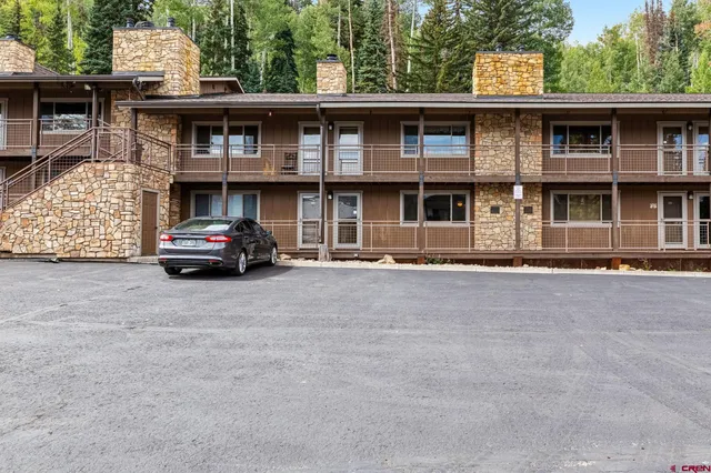 a car parked in front of a house