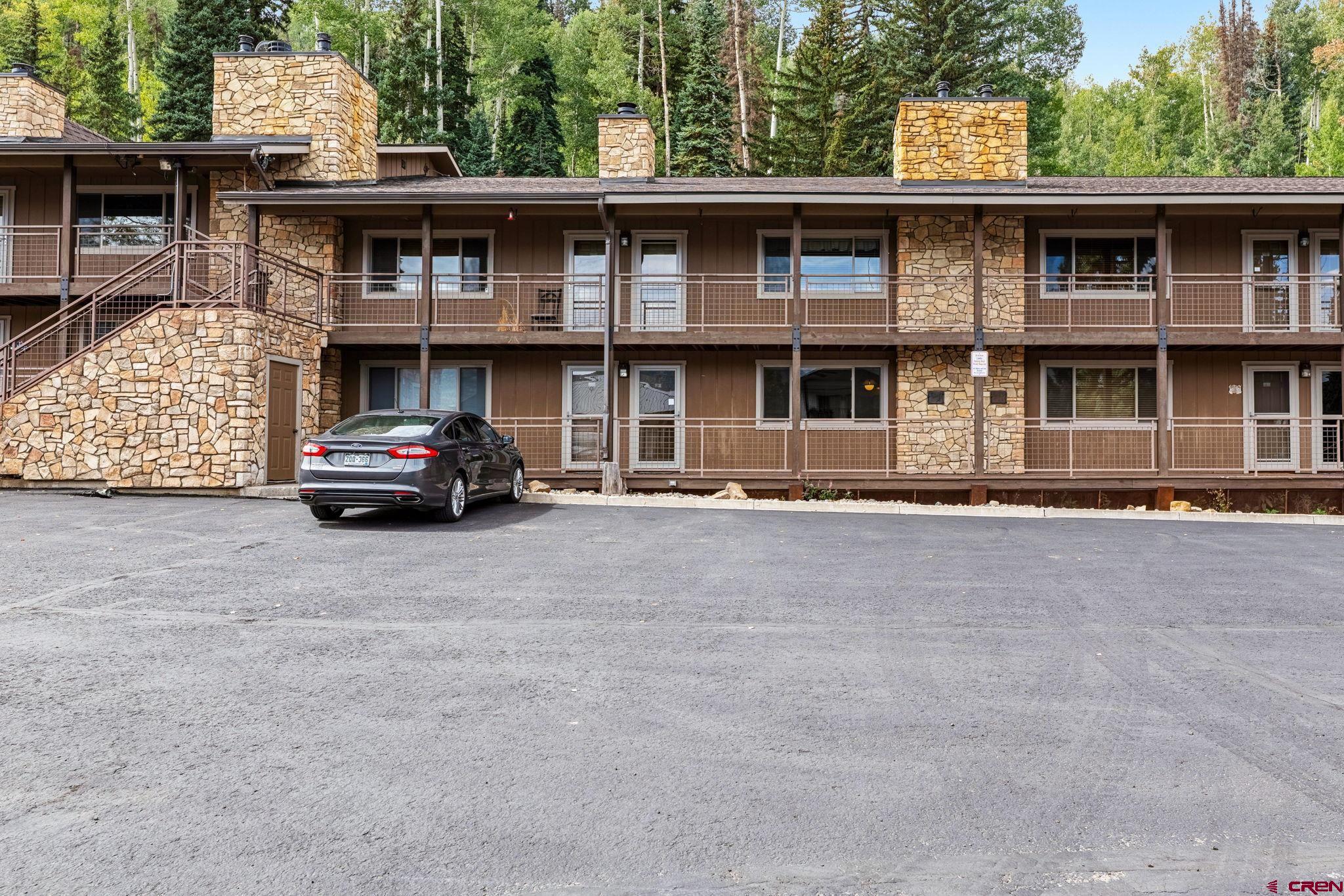 400 Sheol Street, Unit 7 Durango, CO 81301 - Photo 6 of 35 a car parked in front of a house