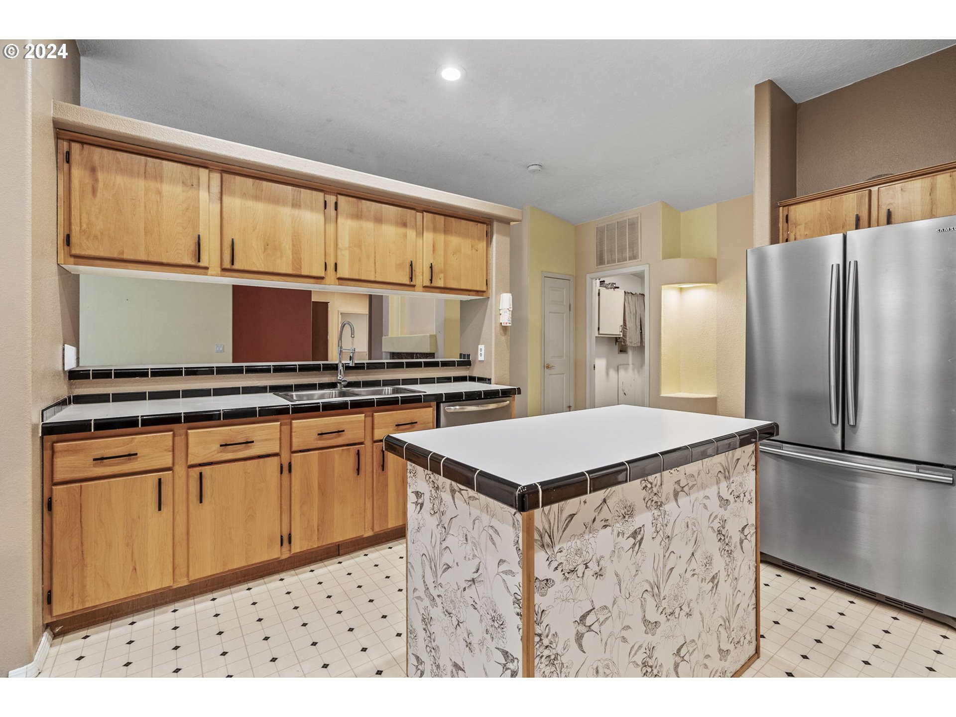 400 Lapham Road Toutle, WA 98649 - Photo 12 of 37 a kitchen with stainless steel appliances a sink and a refrigerator