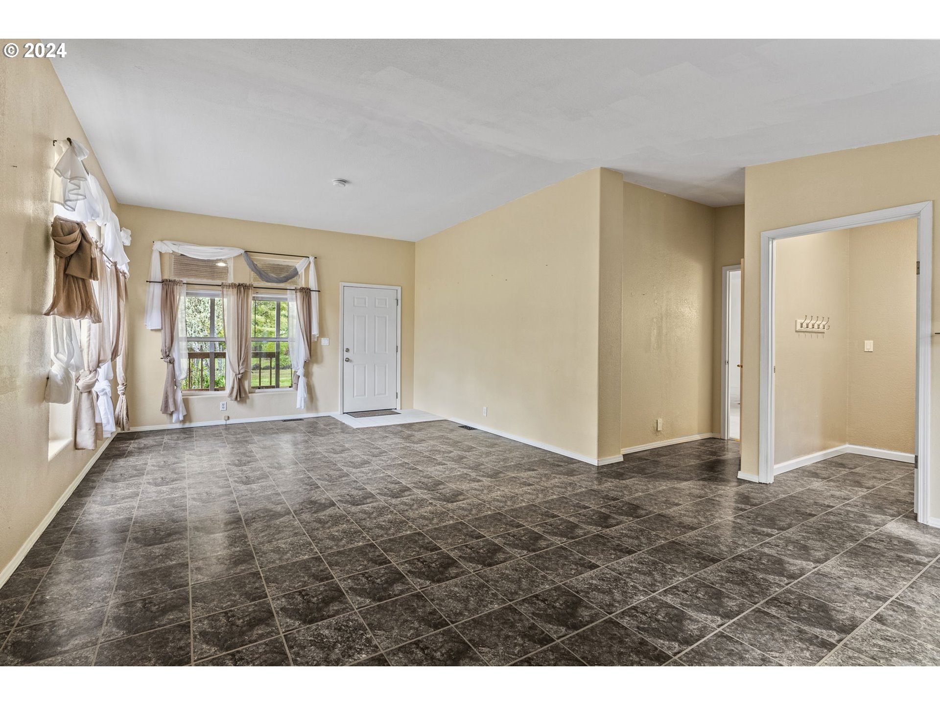 400 Lapham Road Toutle, WA 98649 - Photo 22 of 37 a view of an empty room with a fireplace