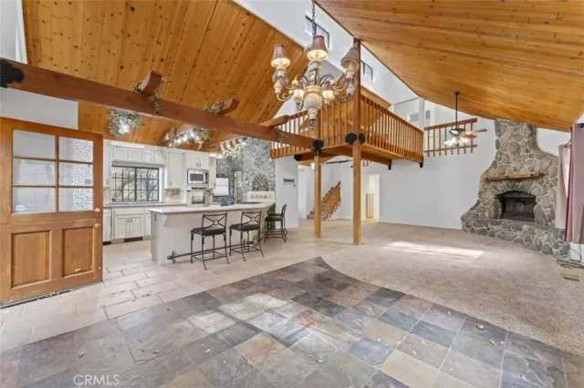 a view of a patio with a table and chairs