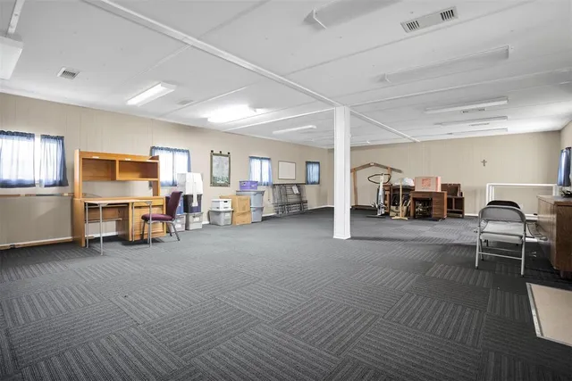 a living room with furniture and a couch