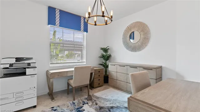 a bathroom with a toilet a sink and a window