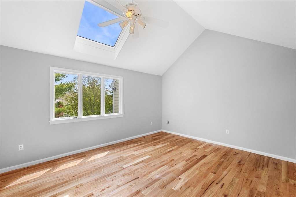 45 Abington Road, Unit 45 Danvers, MA 01923 - Photo 20 of 35 a view of empty room with wooden floor and fan