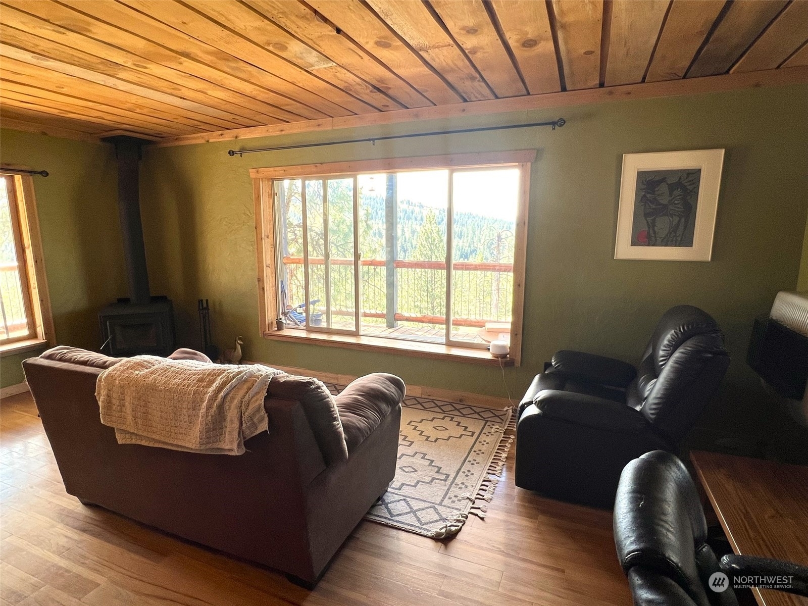 151B Cape Labelle Road Tonasket, WA 98855 - Photo 10 of 33 a living room with furniture and a window