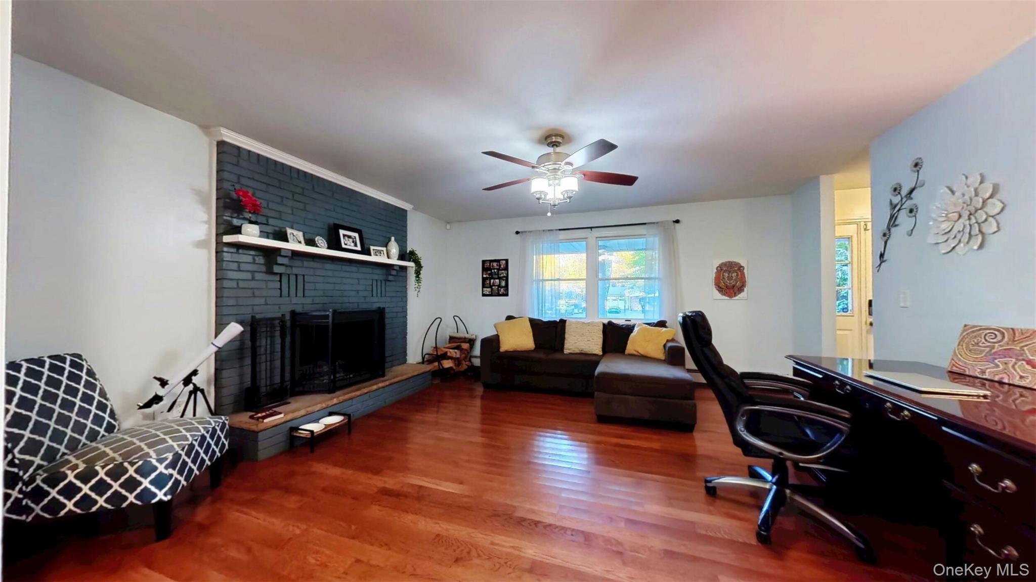 54 Berea Road Walden, NY 12586 - Photo 3 of 6 a living room with furniture and a fireplace