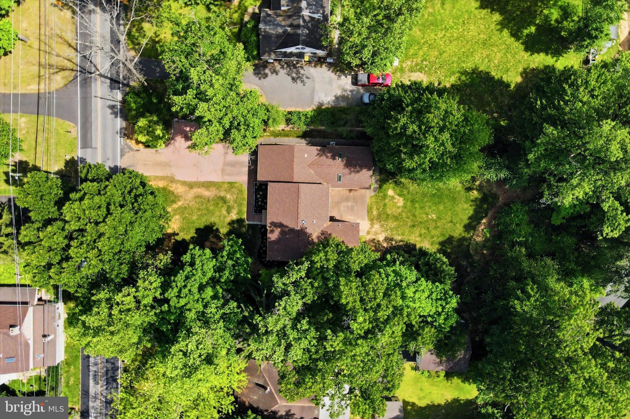 1980 Terwood Road Huntingdon Valley, PA 19006 - Photo 40 of 48 an aerial view of a house with a yard and garden