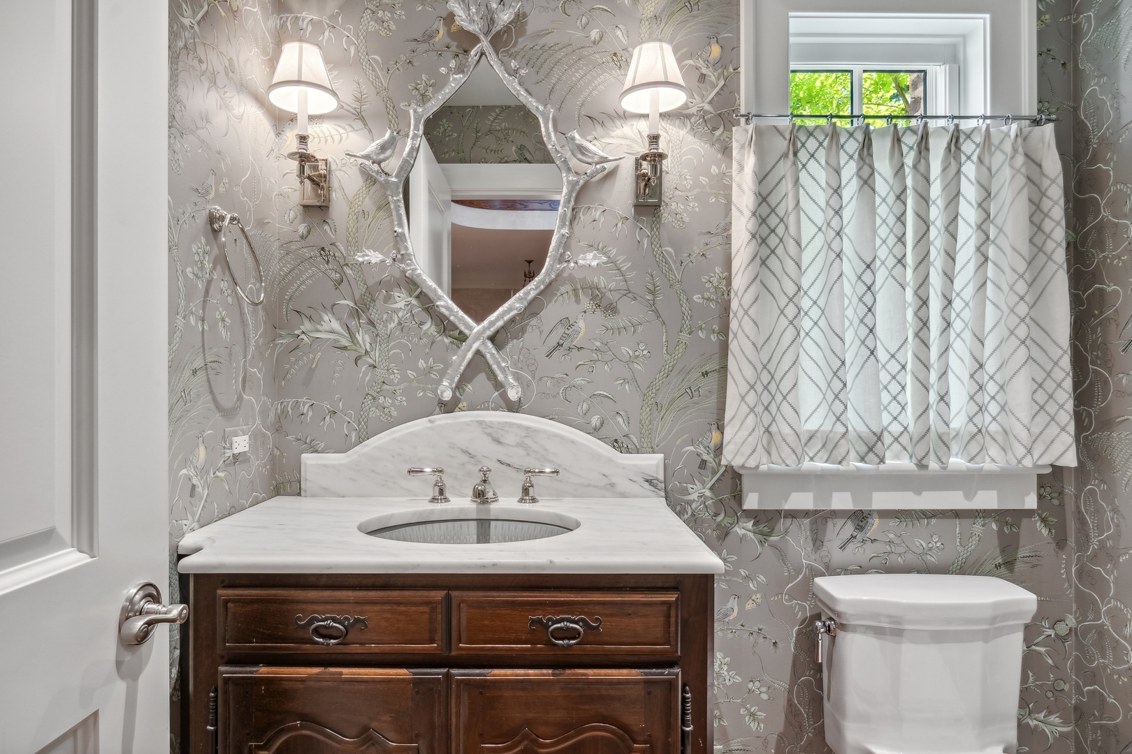 270 Birch Street Winnetka, IL 60093 - Photo 12 of 66 a bathroom with a sink a toilet and mirror