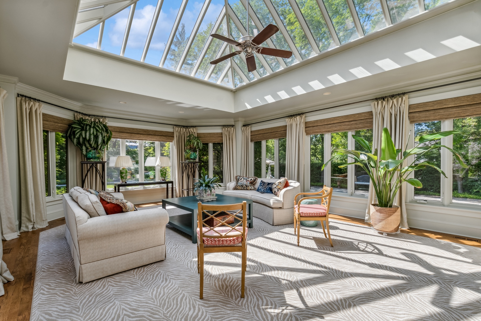 270 Birch Street Winnetka, IL 60093 - Photo 18 of 66 a living room with furniture ceiling fan and a rug