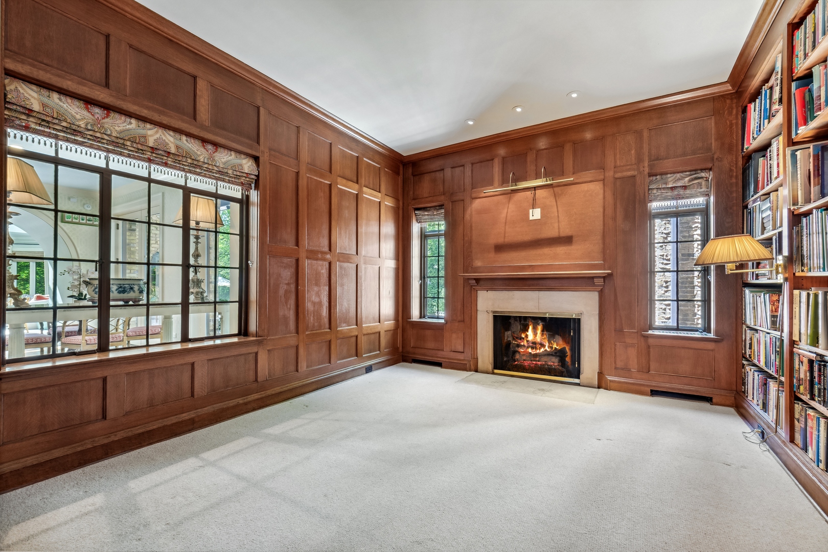 270 Birch Street Winnetka, IL 60093 - Photo 22 of 66 a view of an empty room with window and fire place
