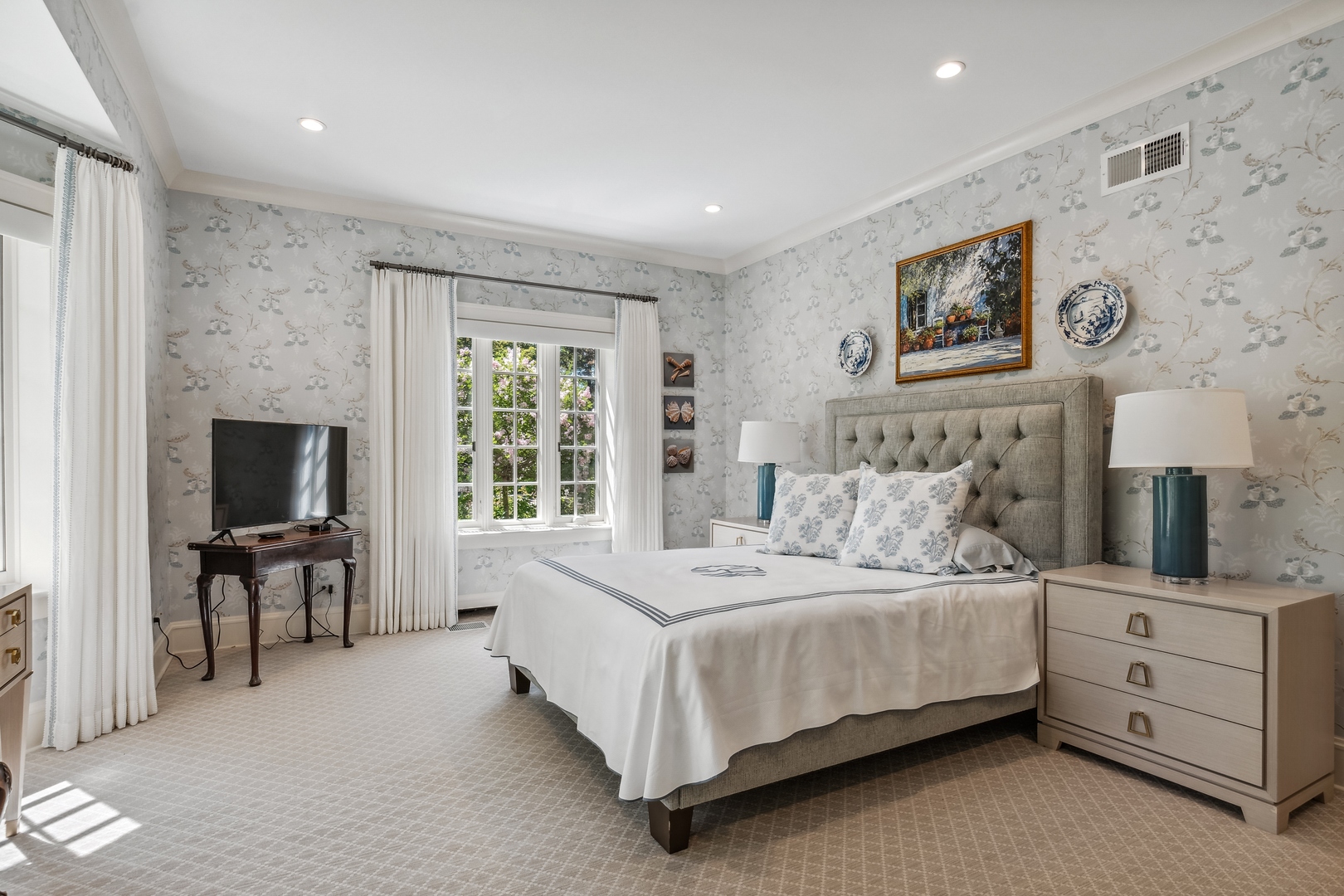 270 Birch Street Winnetka, IL 60093 - Photo 23 of 66 a bedroom with a bed and a flat screen tv