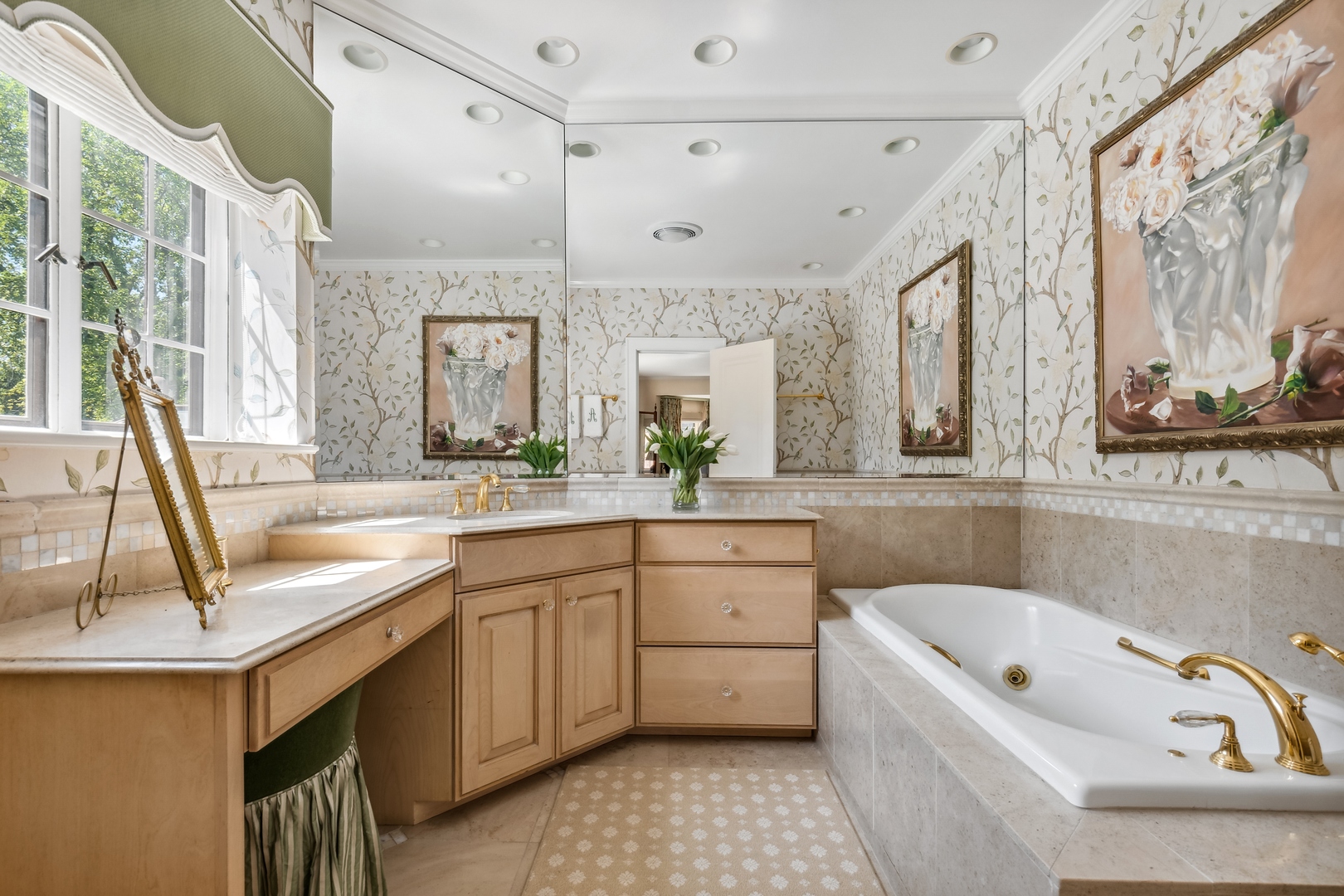 270 Birch Street Winnetka, IL 60093 - Photo 30 of 66 a bathroom with a granite countertop sink mirror and bathtub