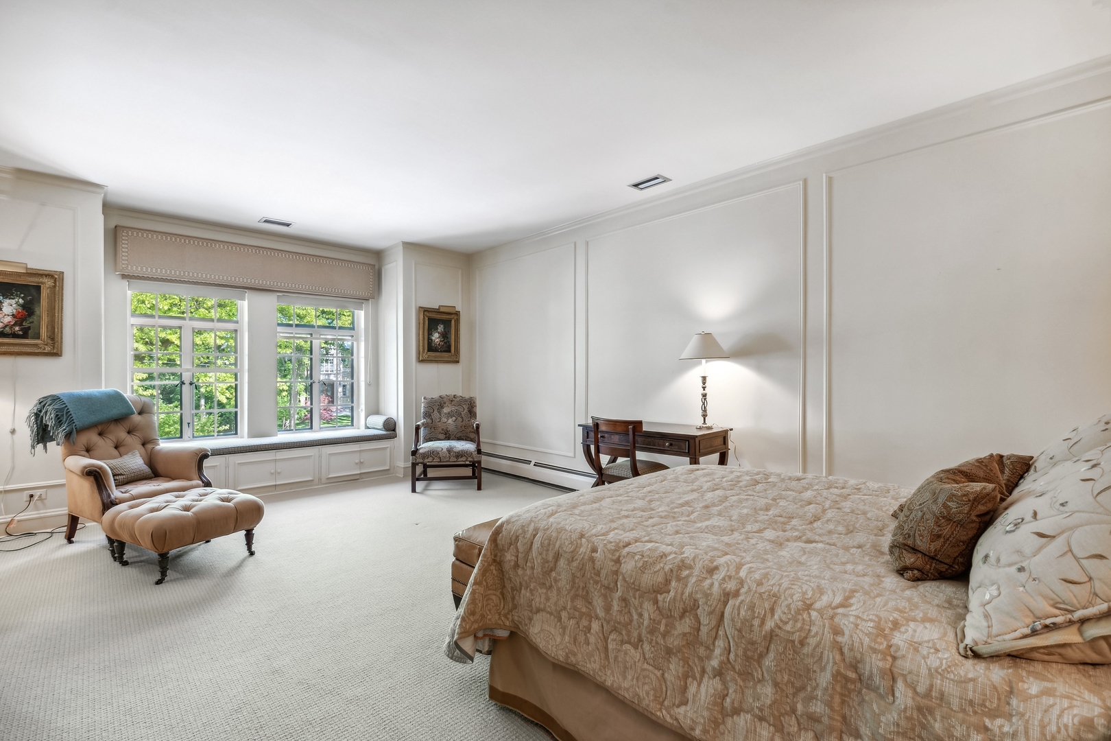 270 Birch Street Winnetka, IL 60093 - Photo 36 of 66 a spacious bedroom with a bed and large windows