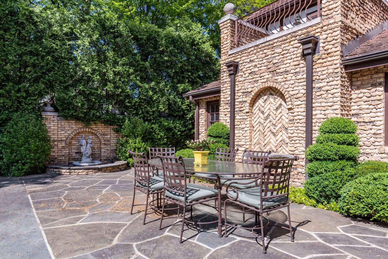 270 Birch Street Winnetka, IL 60093 - Photo 38 of 66 a view of patio with a table and chairs and potted plants