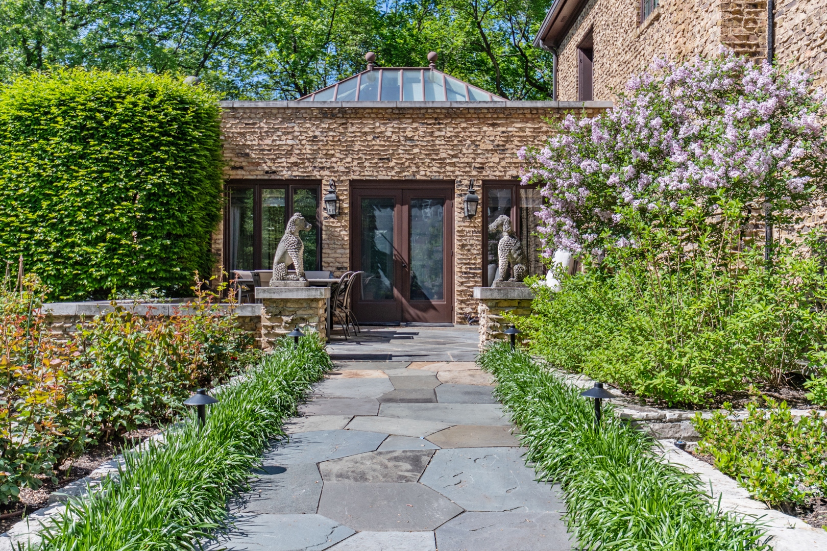 270 Birch Street Winnetka, IL 60093 - Photo 48 of 66 a view of a house with potted plants