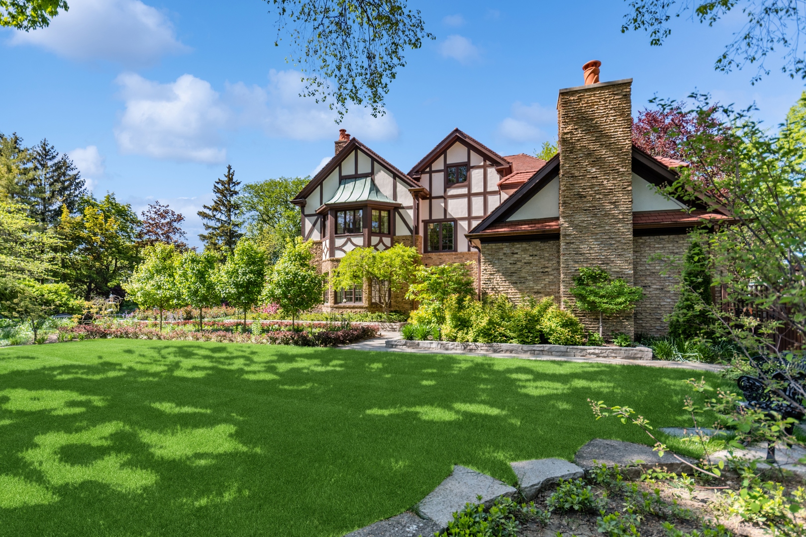 270 Birch Street Winnetka, IL 60093 - Photo 49 of 66 a front view of a house with a yard