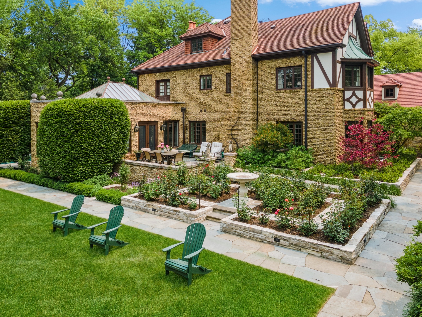270 Birch Street Winnetka, IL 60093 - Photo 55 of 66 a view of backyard of house with outdoor seating and green space