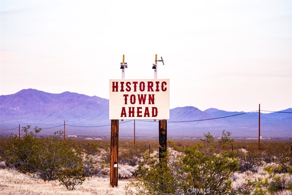 0 Street Nipton Ca Nipton, CA 92364 - Photo 5 of 7 a view of a street with a building in the background
