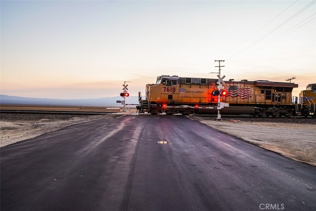 0 Street Nipton Ca Nipton, CA 92364 - Photo 6 of 7 a car parked on the side of the road