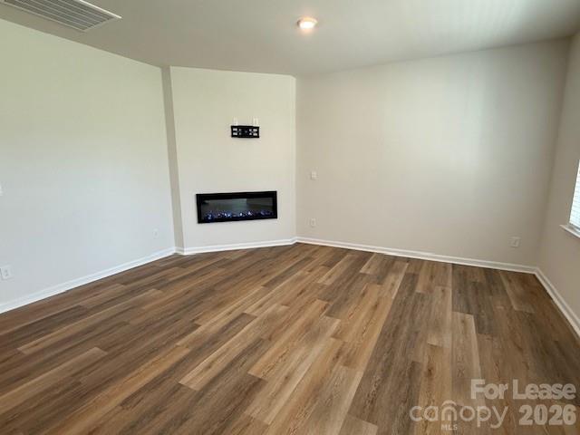 2315 Riggs Road Sherrills Ford, NC 28673 - Photo 10 of 17 a view of an empty room with wooden floor