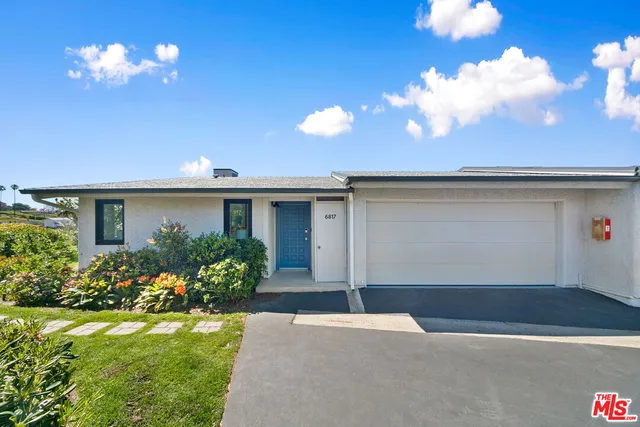 a view of a house with a patio