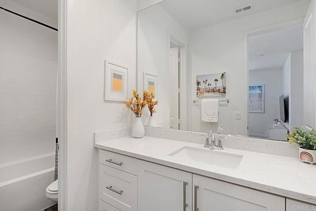 a bed room with a bed and a window